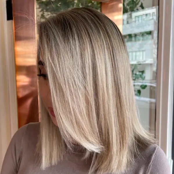 Sleek ash blonde lob