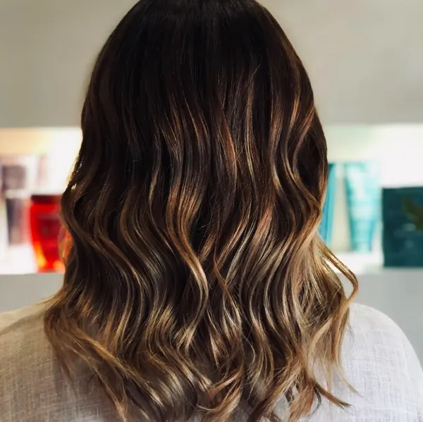 Dark brunette with caramel balayage ends